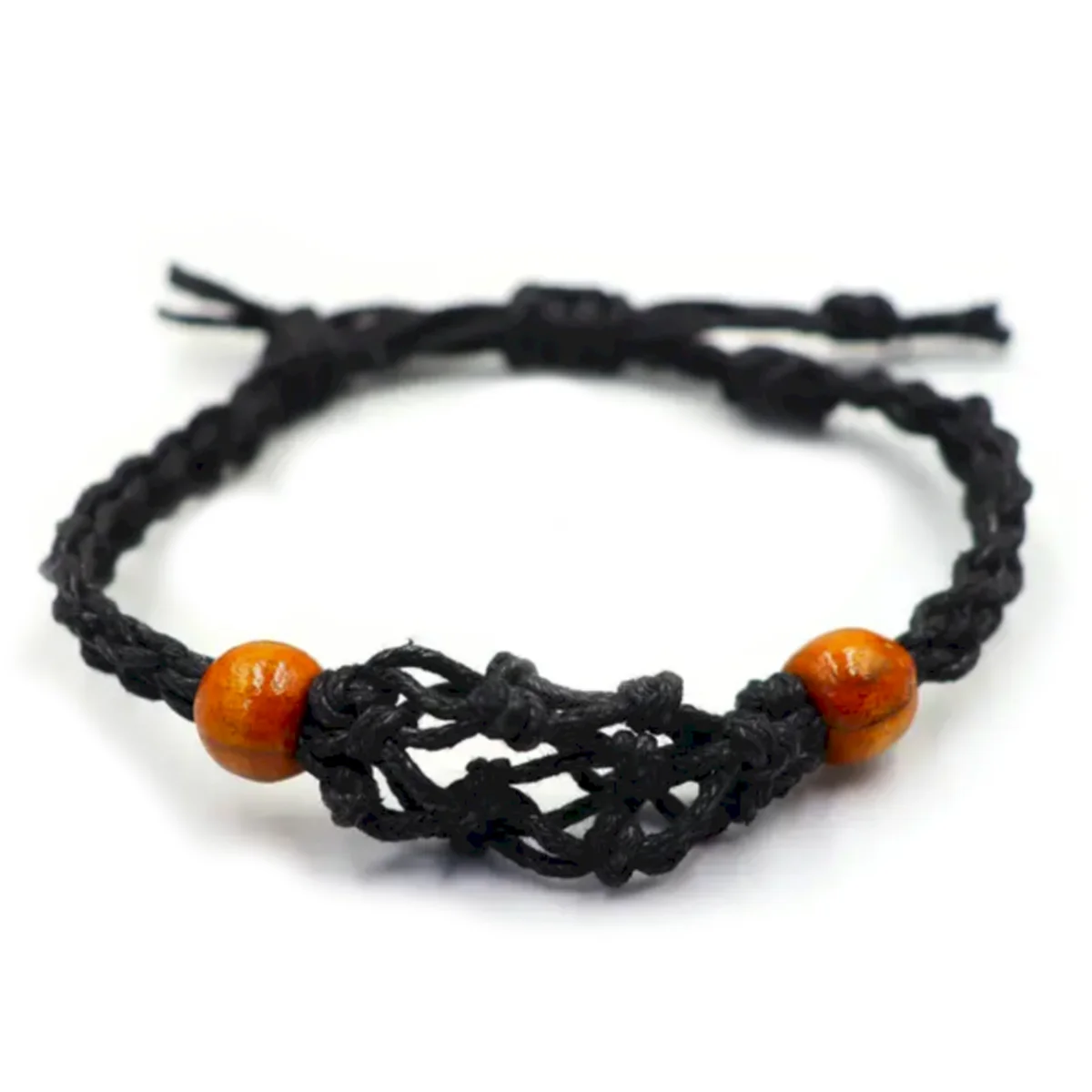 Close-up of black gemstone bracelet making cord coiled neatly on a white background
