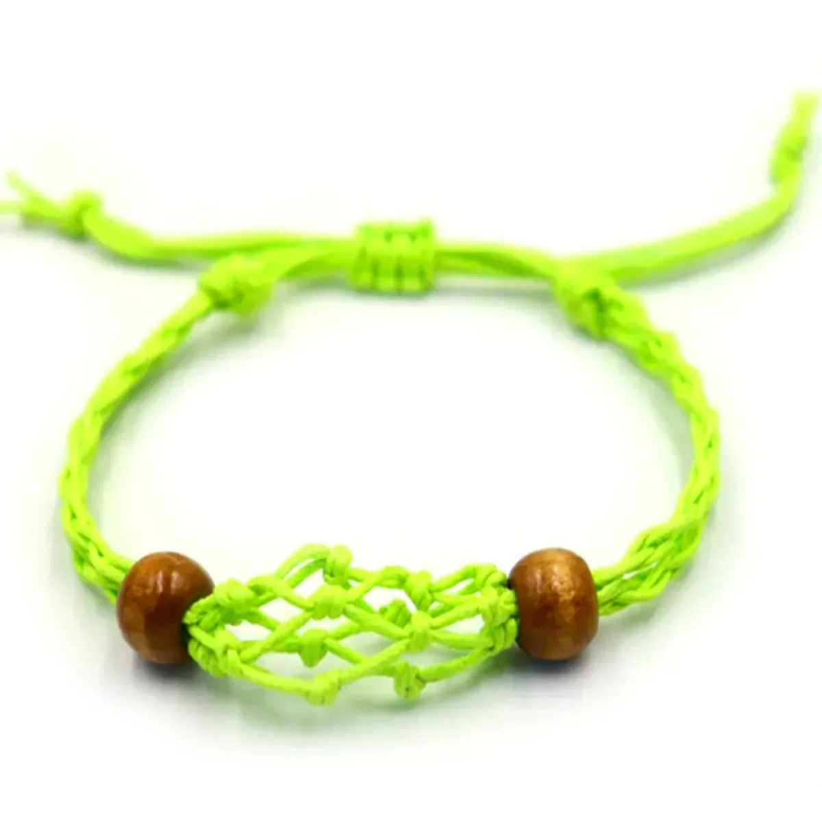 Close-up of green gemstone bracelet cord showing braided texture and vibrant green color