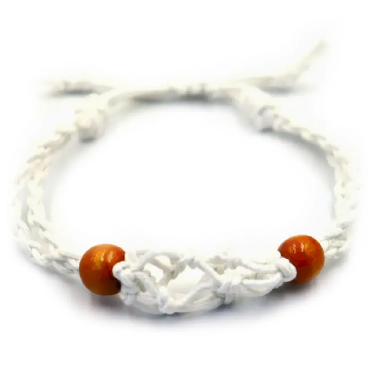 Close-up of white gemstone bracelet making cord coiled neatly on a plain background