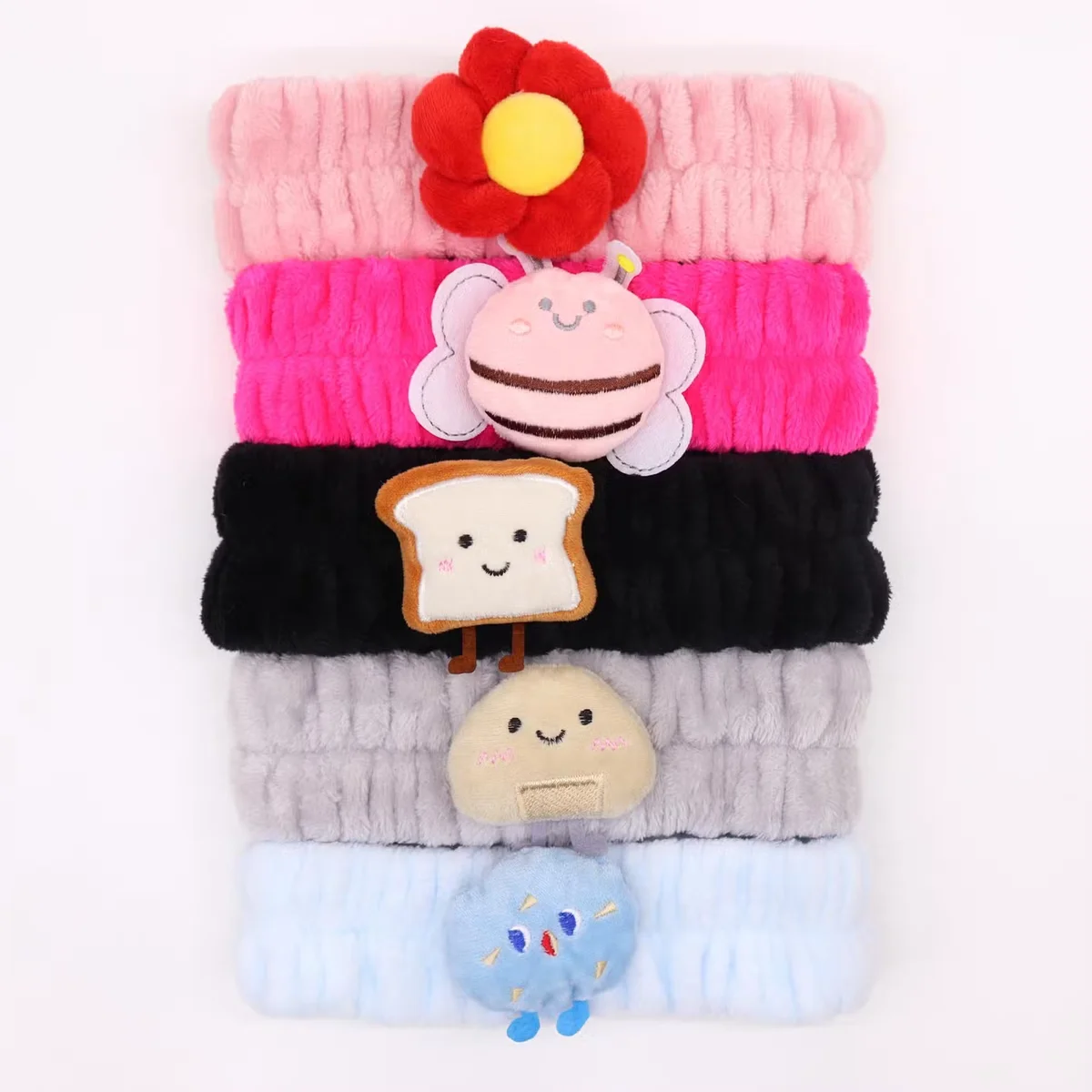 Assorted Toast & Friends cute makeup headbands in pastel colors, showcasing stylish hair bands for daily wear