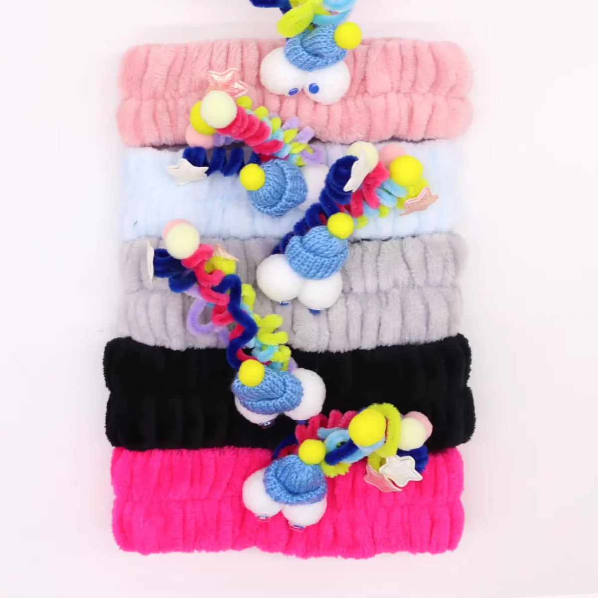 Assorted cute Party Monsters makeup headbands displayed, stylish makeup accessories for fun party looks