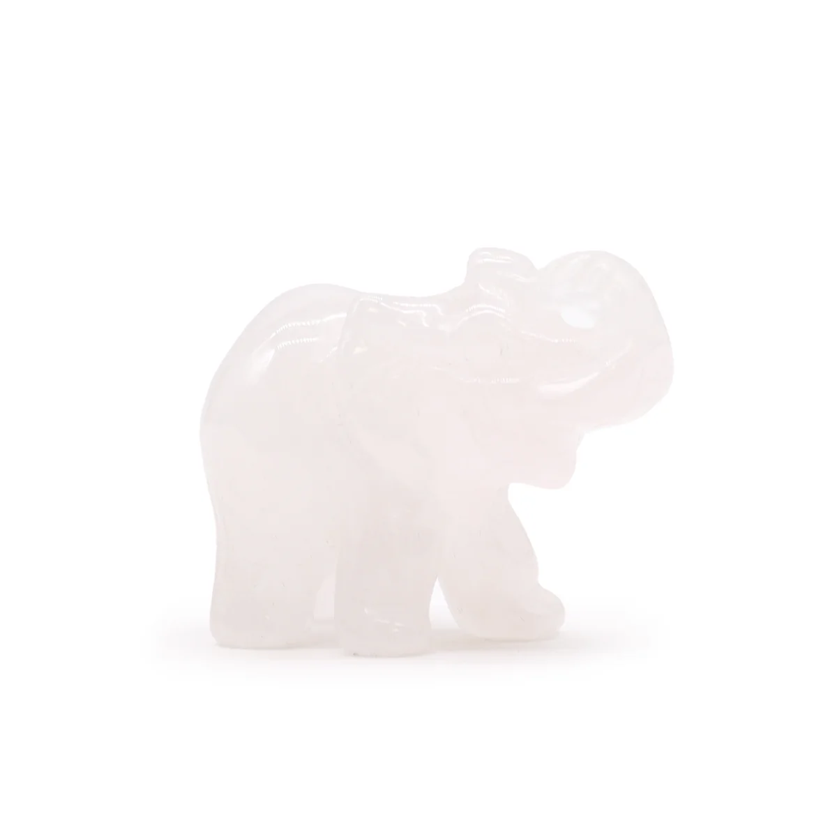 Rose quartz figurine shaped as a lucky elephant with smooth polished surface and soft pink hue on white background