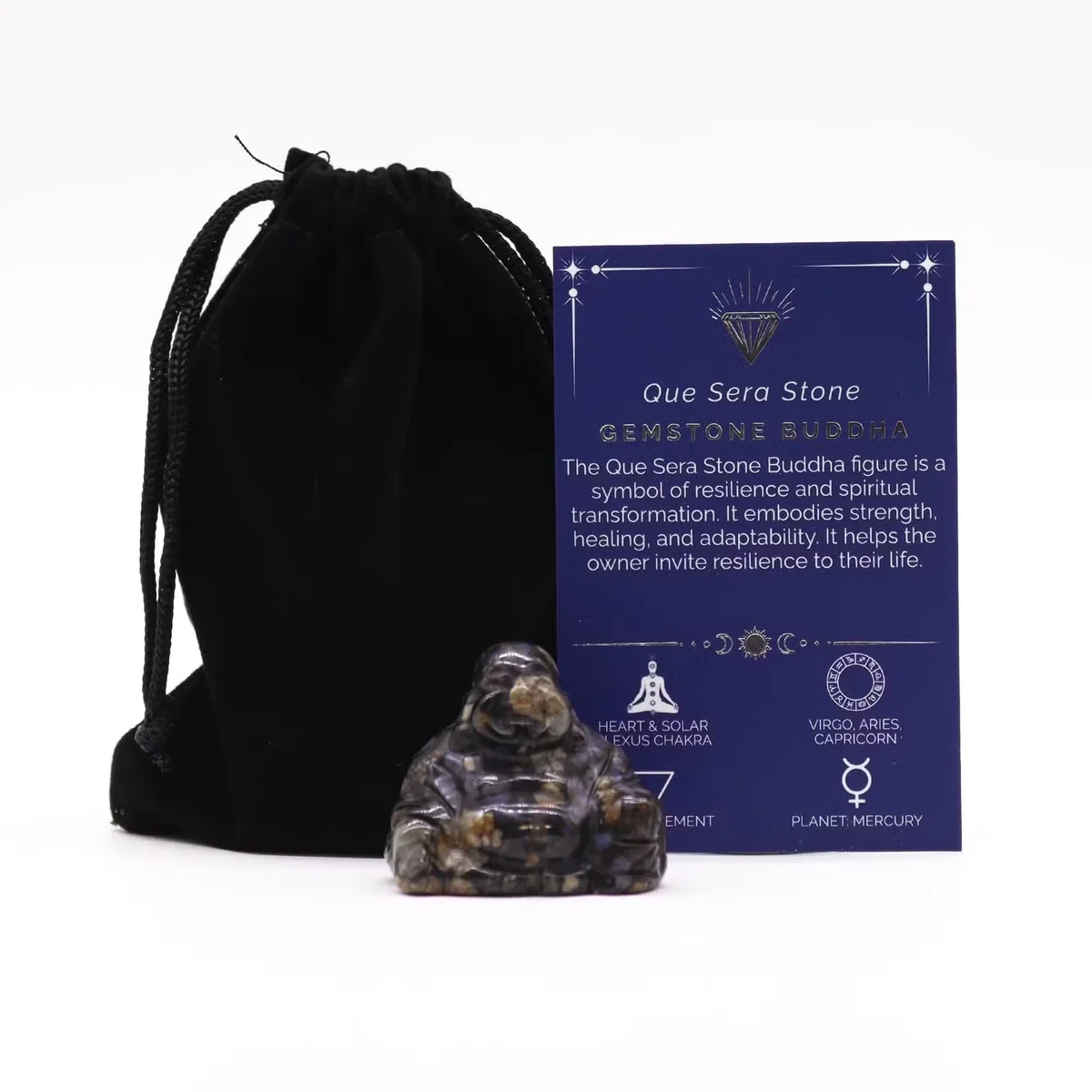 Small decorative gemstone Buddha carved from Que Sera stone sitting peacefully on a white background