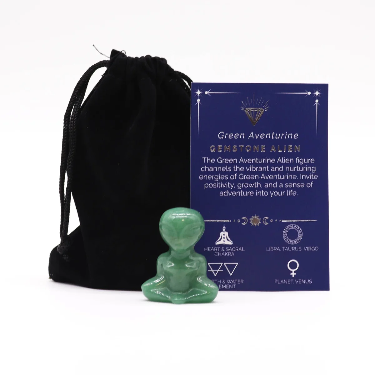 Green aventurine ornament shaped like a tiny alien figure
