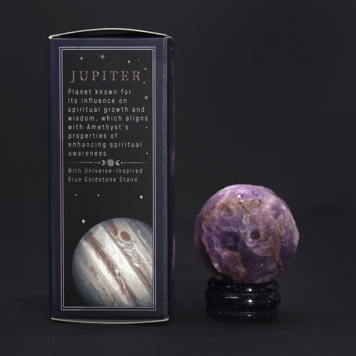 Amethyst decorative gemstone planet on a goldstone stand, styled as planet Jupiter