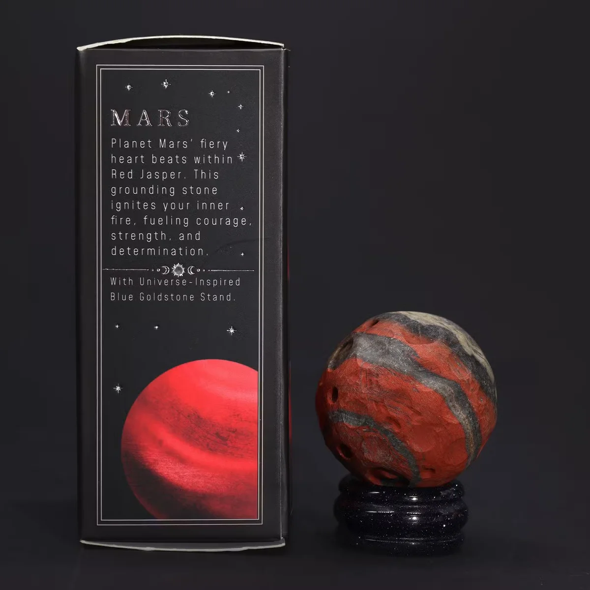 Red jasper planet ornament on a Sola goldstone stand, styled as a mars planet ornament