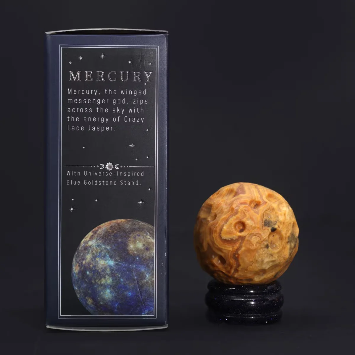 Mercury planet figurine in Crazy Lace Jasper perched on a Sola Goldstone stand.