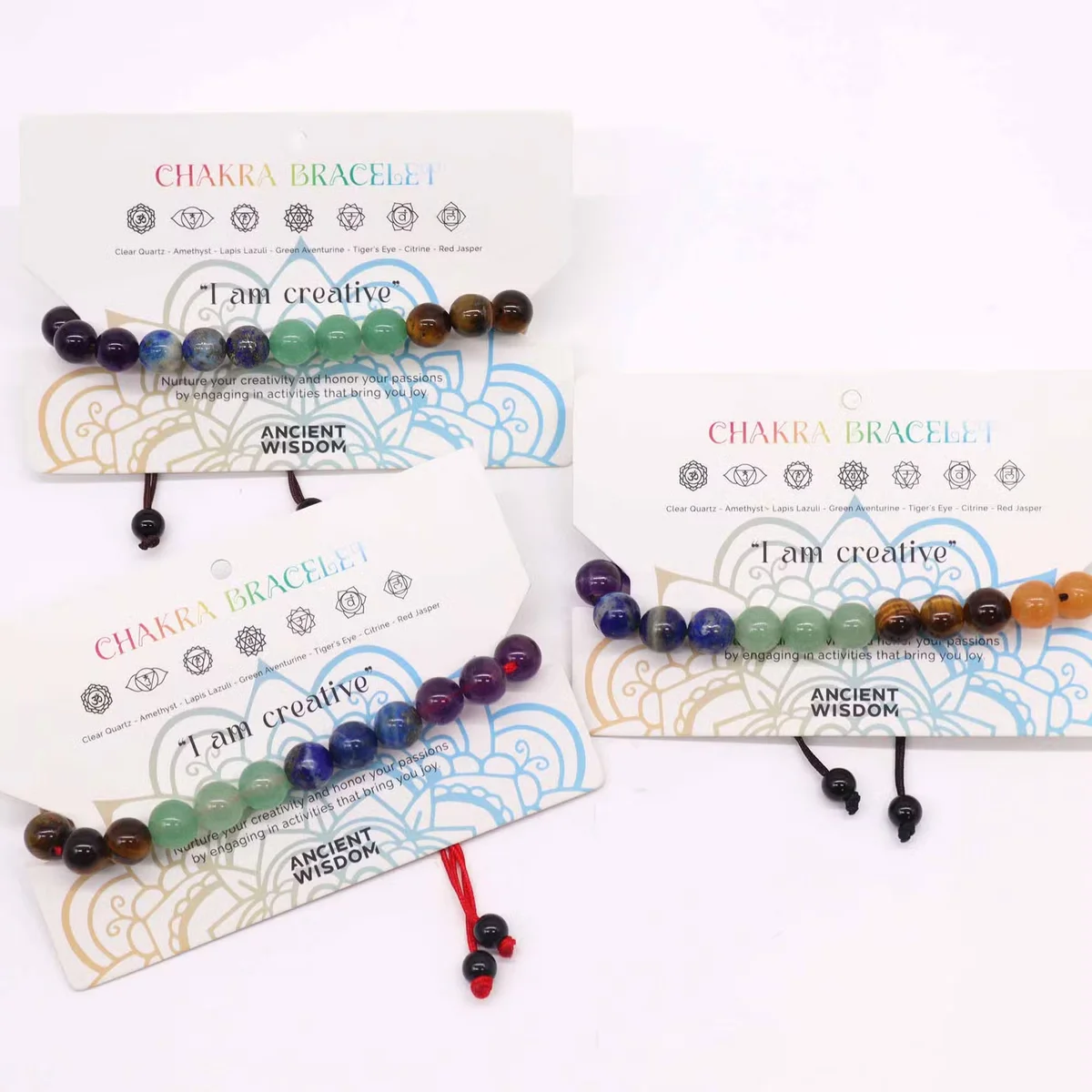 Chakra string bracelet with 21 colorful stones, designed as a healing stone bracelet for energy balance