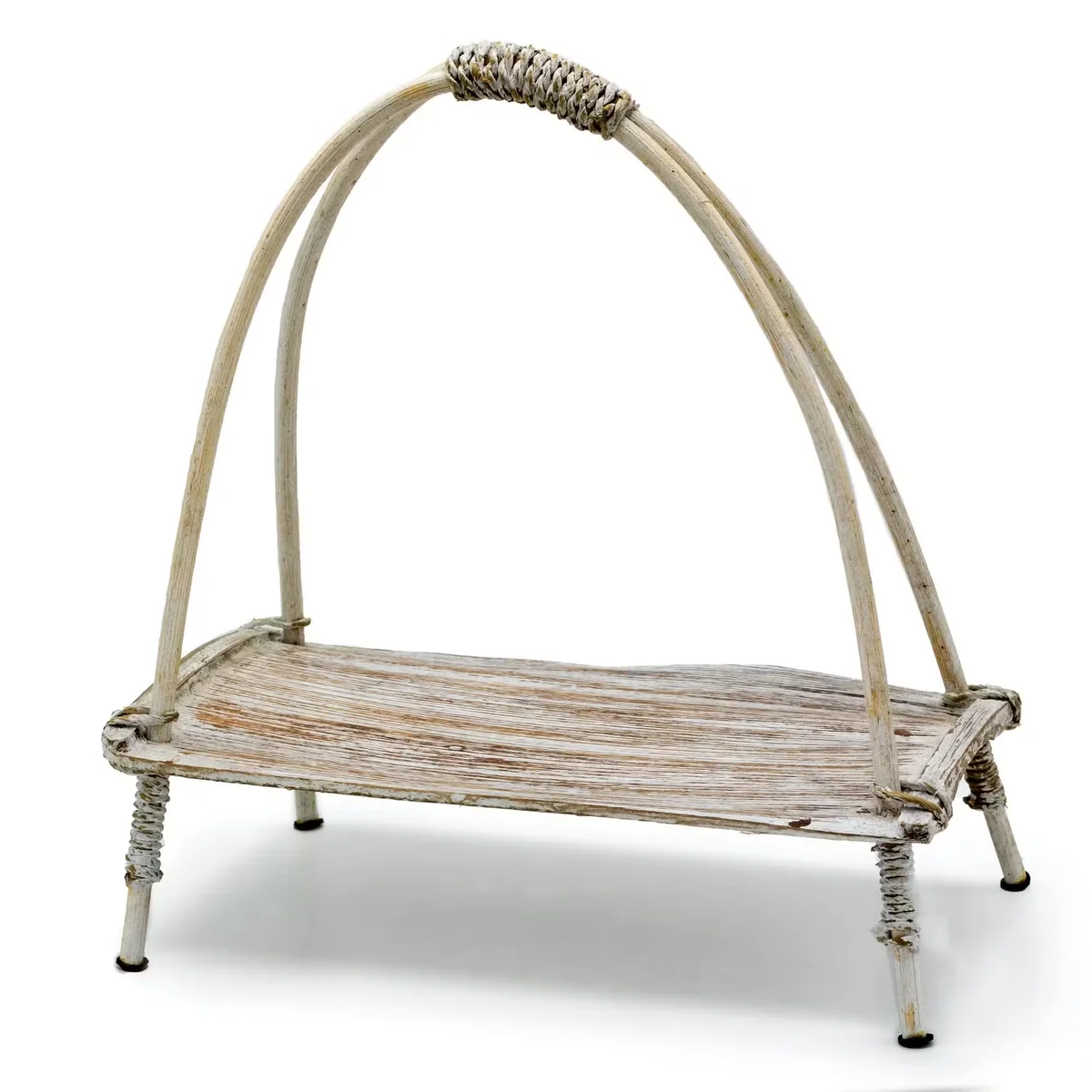 Whitewashed coconut leaf decorative tea stand with layered shelves for displaying tea cups and accessories