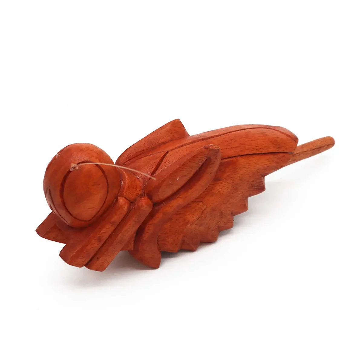 Decorative wooden grasshopper toy with articulated legs and natural wood finish on plain background