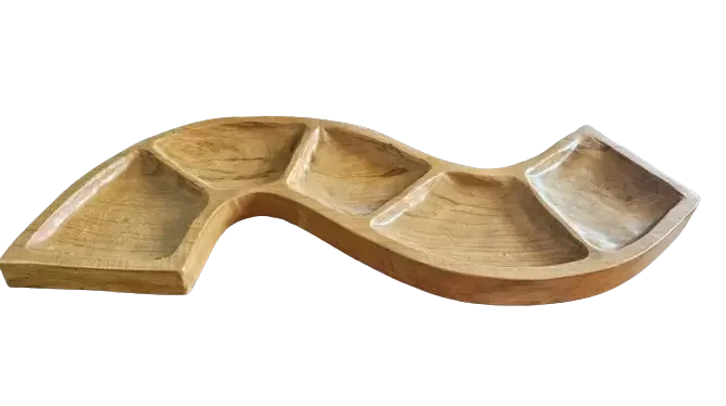Snake shaped teak wood bowl with smooth finish and natural wood grain visible on surface