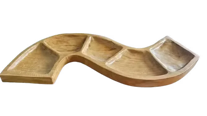 Snake shaped unique serving bowl made from teak wood with smooth finish and natural grain details on white background