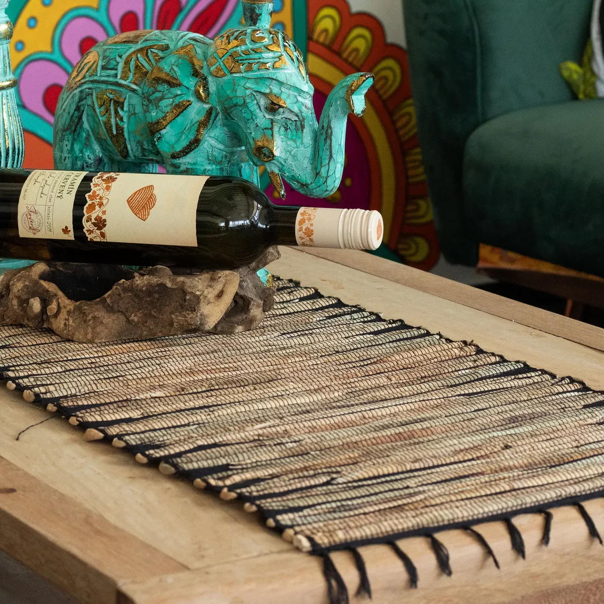 Black Tiger patterned water hyacinth table runner with fringe, laid flat showing natural woven texture, 150cm length