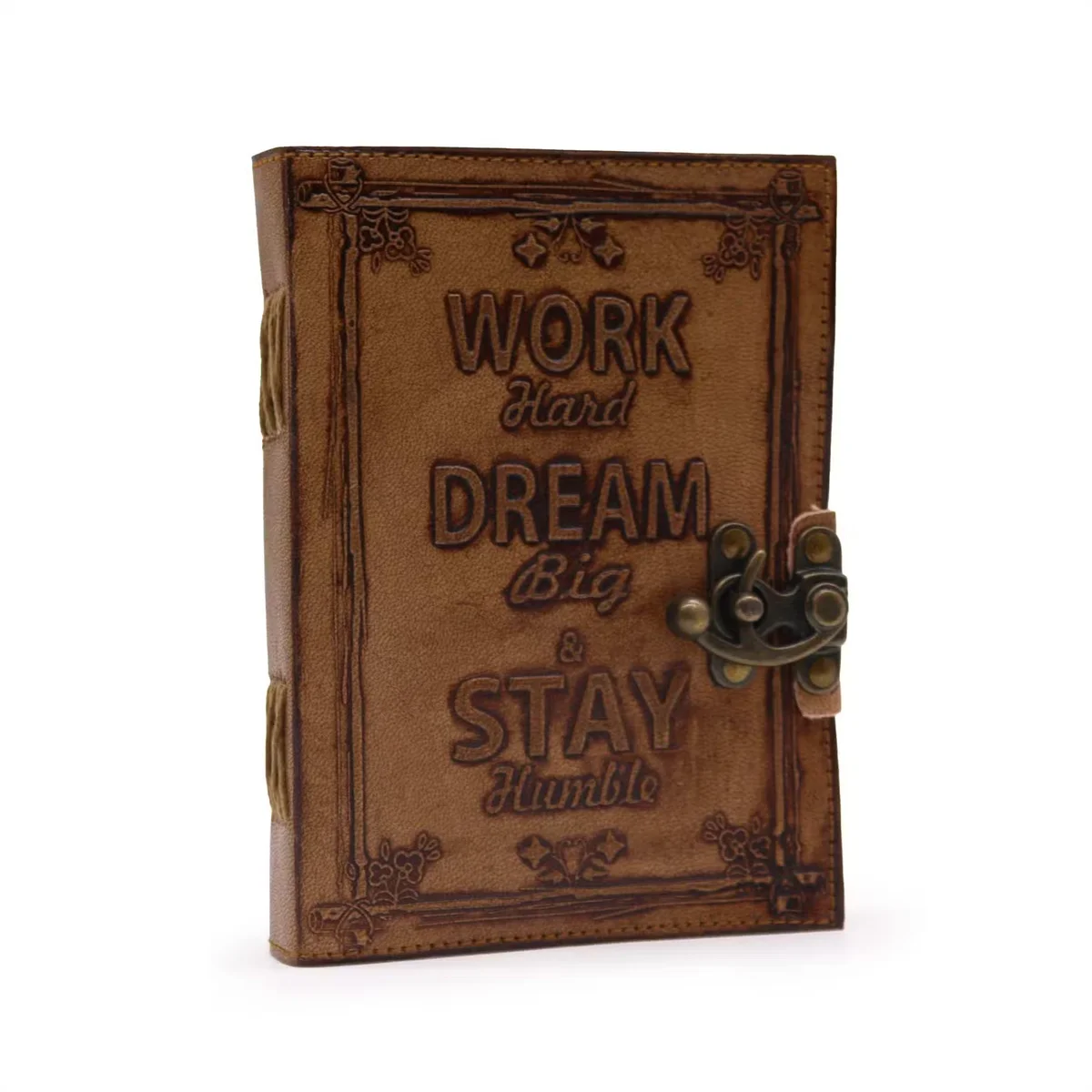 Brown leather notebook with plain paper and embossed text "Work & Dream Big" on the cover