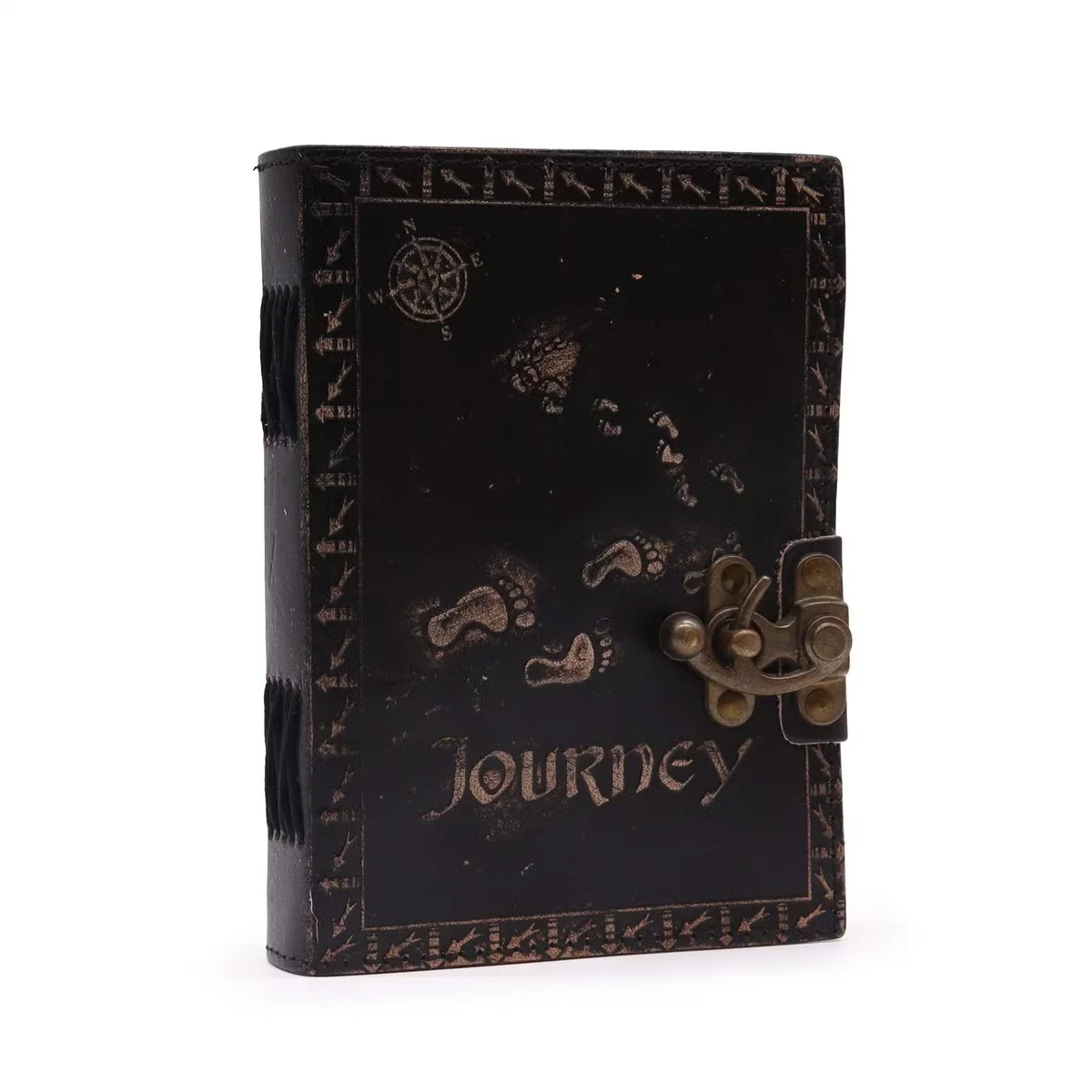 Brown leather writing journal with plain paper pages titled Journey shown open on a flat surface