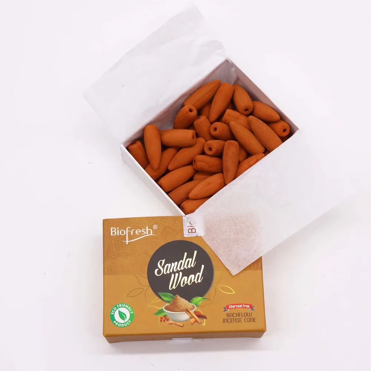 Biofresh sandalwood backflow incense cones arranged for home use with smoke flowing downwards, incense cones for home