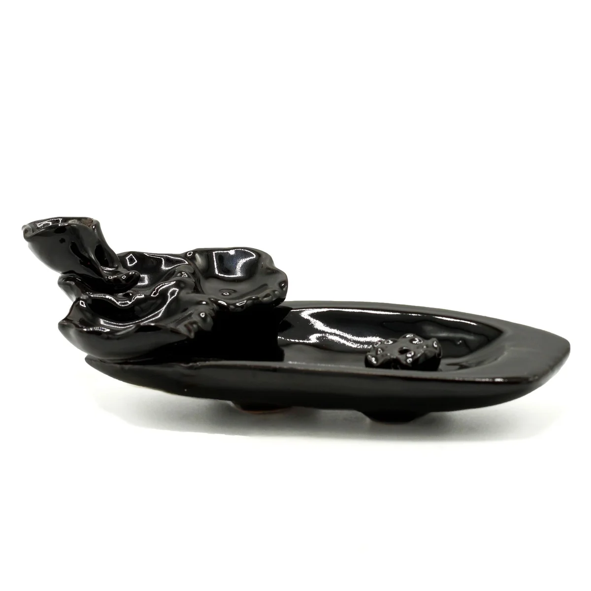 Backflow incense burner shaped like a lotus pond with incense stick holder, designed for calming smoke flow effects