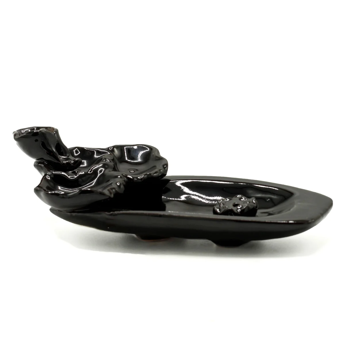 Lotus pond backflow incense burner with incense stick holder releasing smoke downwards in a decorative design