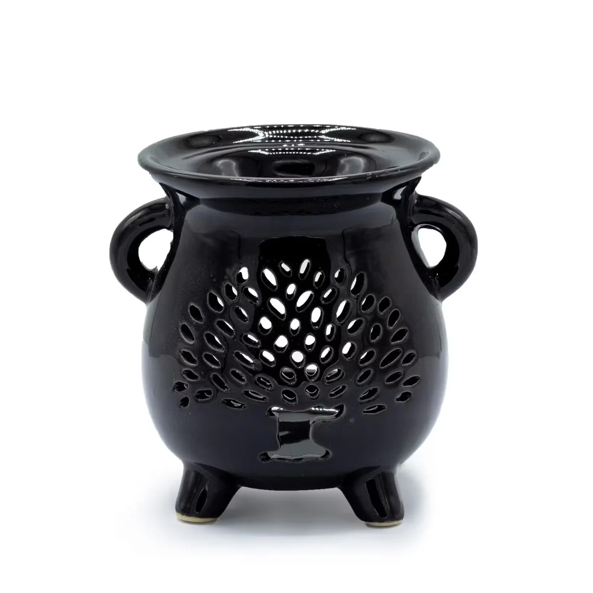 Black cauldron oil burner with tree of life pattern, a decorative oil burner for home ambience.