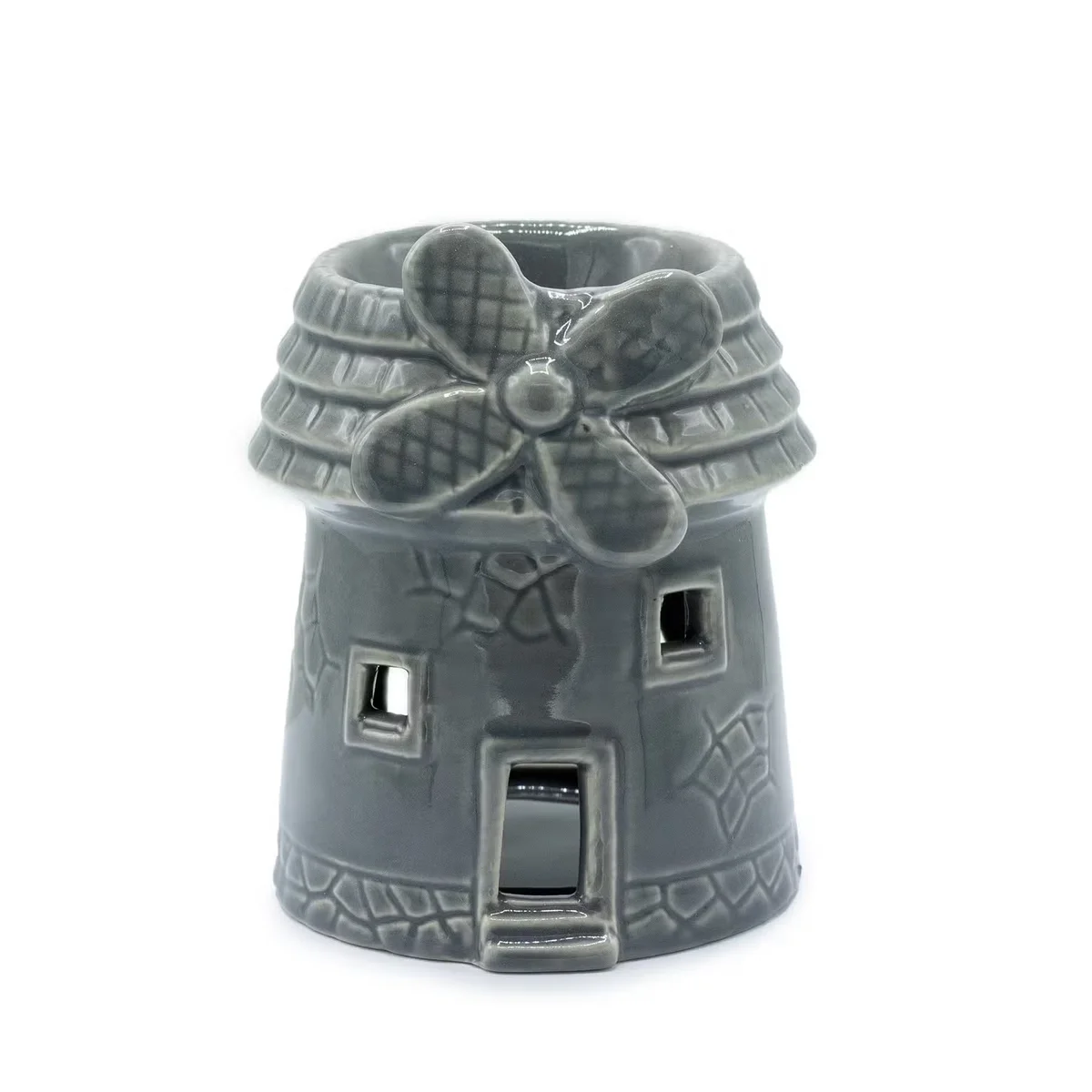 Grey windmill oil burner on display, a sleek home fragrance burner