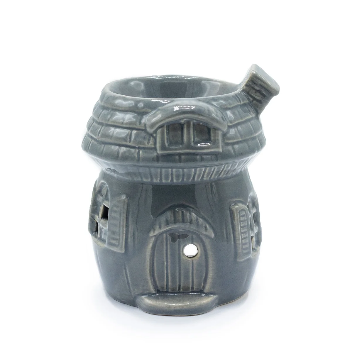 Grey mushroom house shaped oil burner, displaying a round base with a mushroom‑like top.