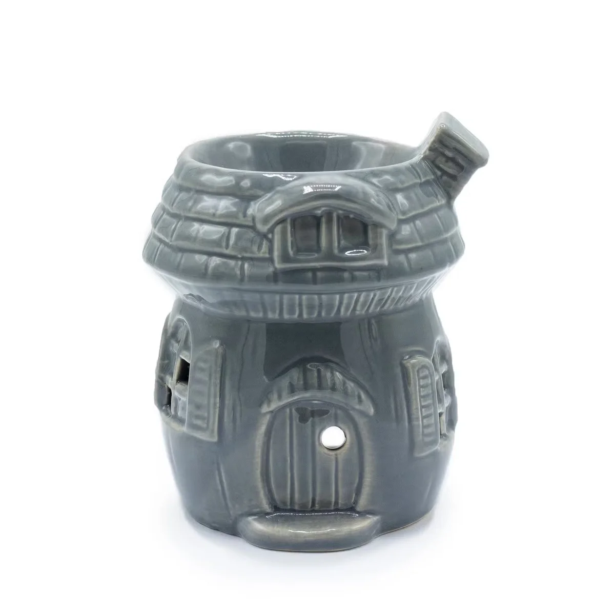 Grey mushroom-shaped oil burner, showcasing sleek design, an elegant home fragrance burner.