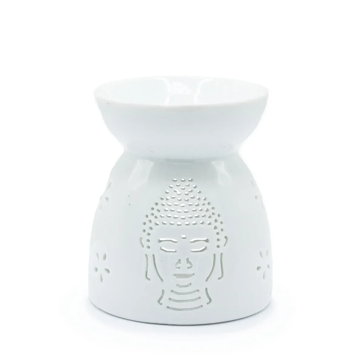 White Buddha oil burner with cut‑out design.