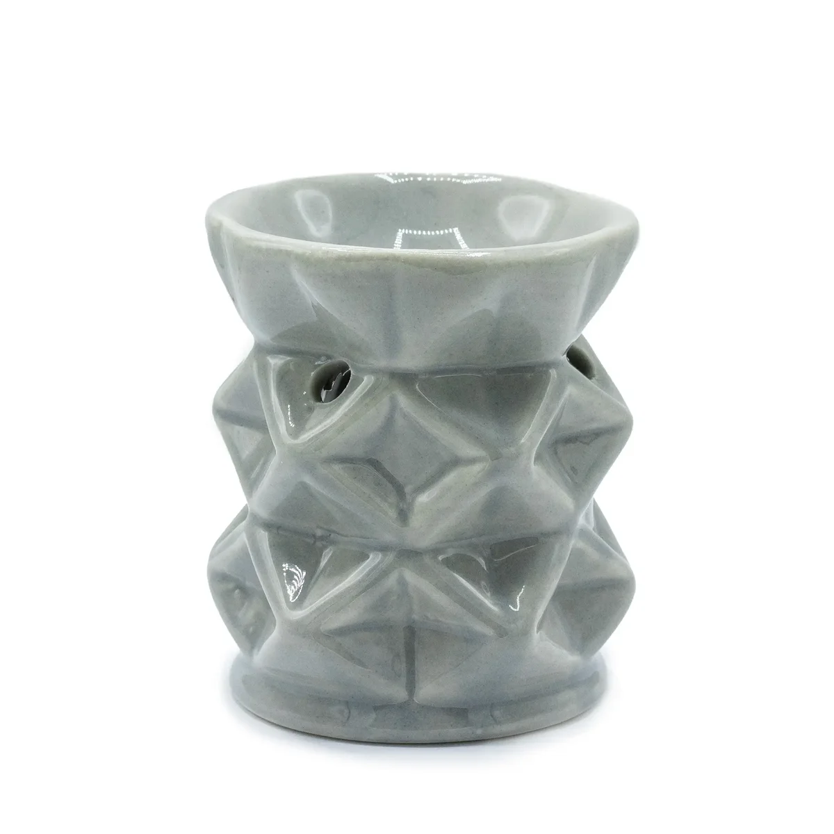 Grey geometric oil burner with angular design for home fragrance and essential oils use