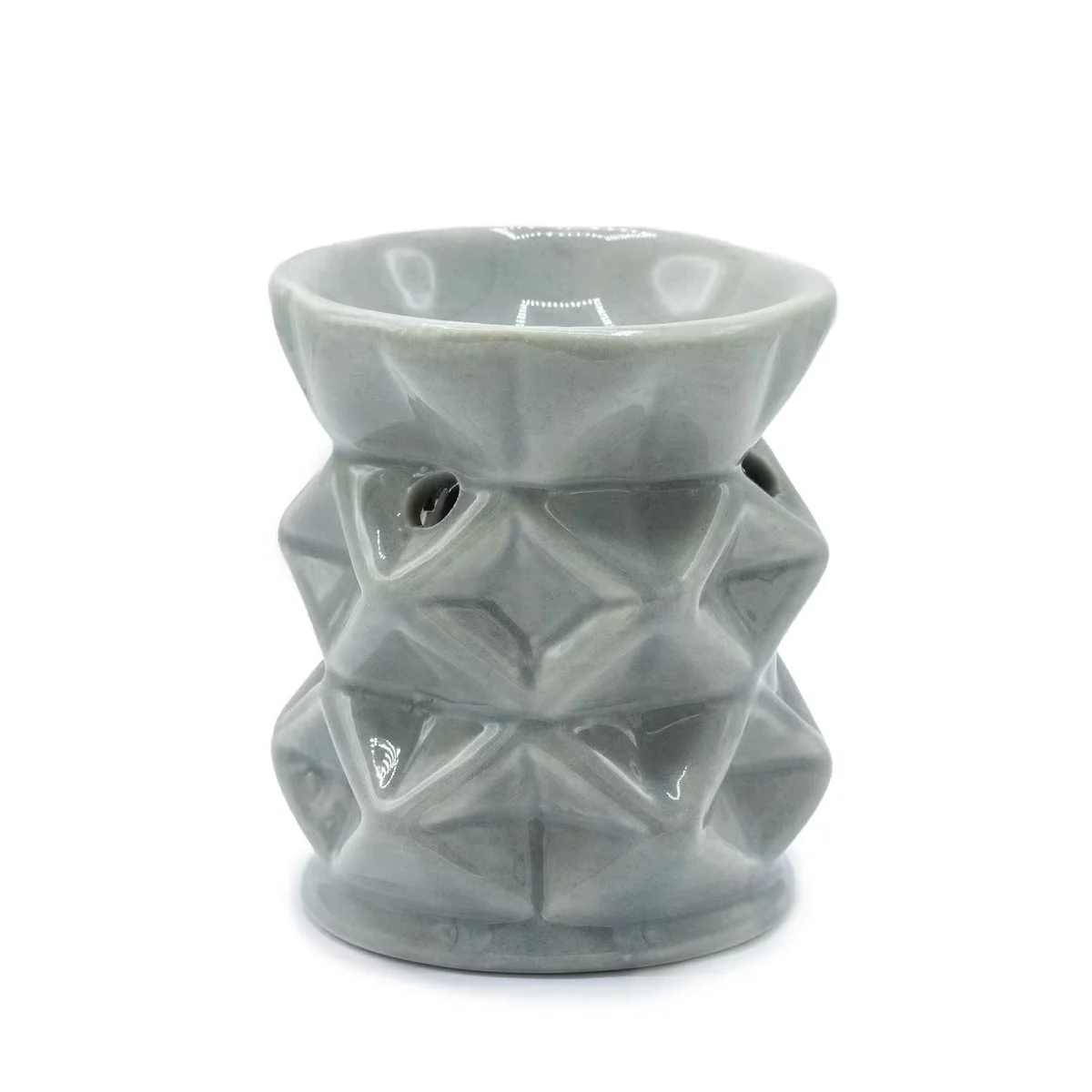 Grey geometric home fragrance burner with angular design for stylish scent diffusion in living spaces