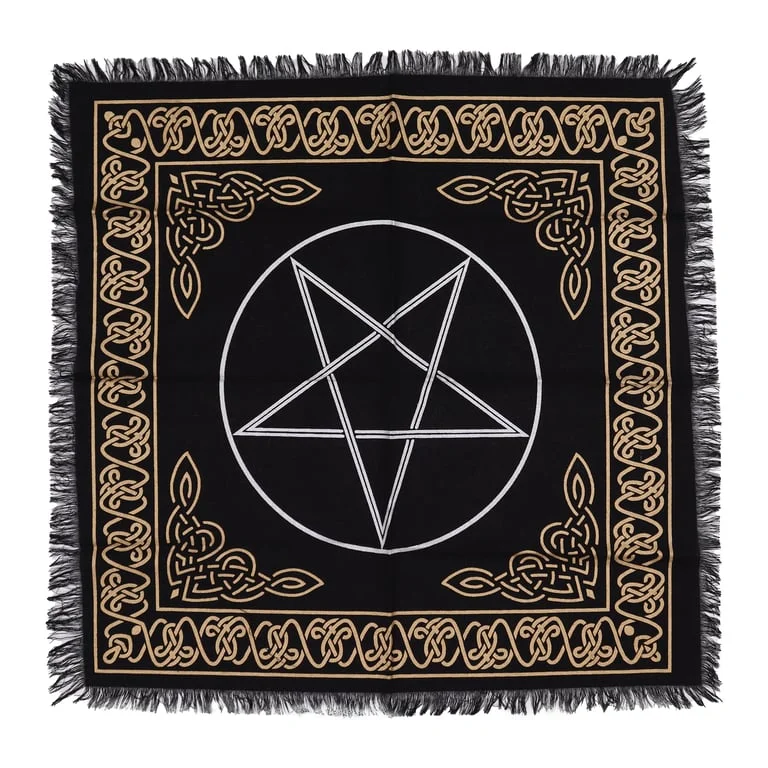Esoteric altar cloth with pentagon design and fringed edges laid flat on a surface