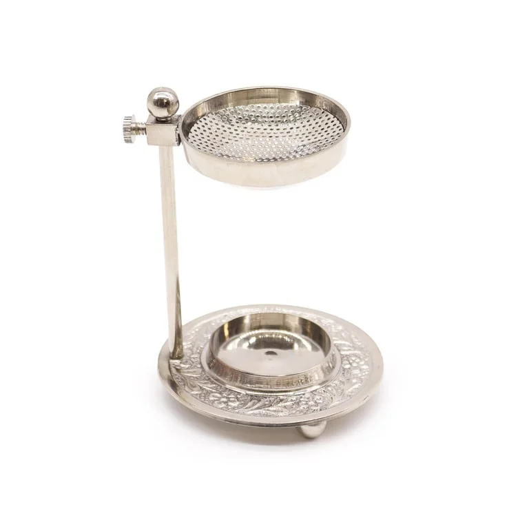Adjustable incense warmer made from plated brass with a resin core, showing its polished metal base and sliding mechanism.