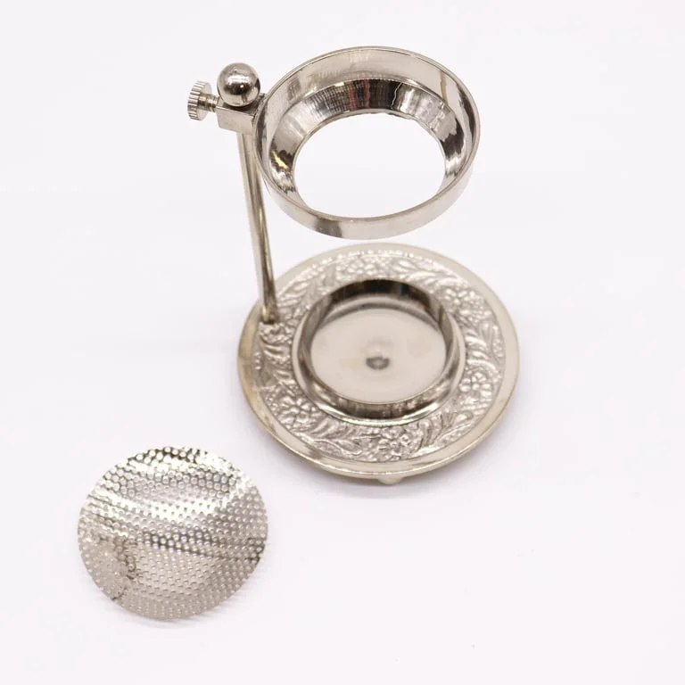 Plated brass resin adjustable incense heater in use, warming incense sticks with a stylish, adjustable design.