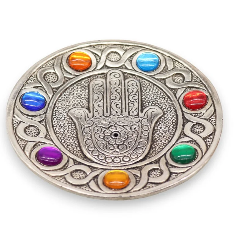 Seven Chakra hamsa incense holder shown in a close‑up, its distinctive shape highlighted.