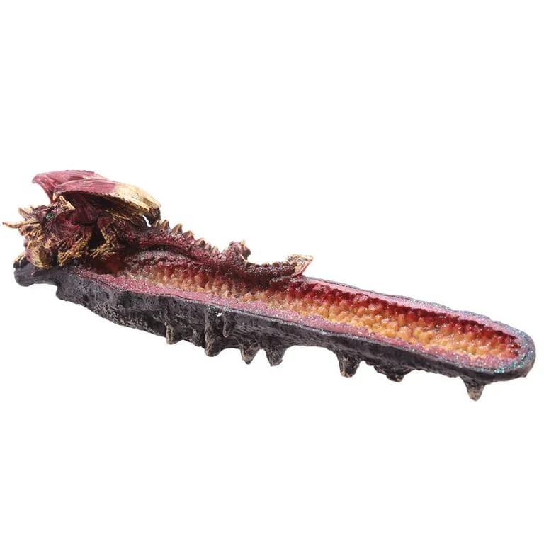 Geode crystal ashcatcher shaped like a dragon, with crystal outcrop design, used for incense.