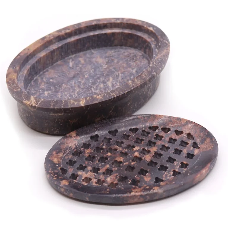 Classic oval soapstone bathroom soap holder and drainer measuring 11x8cm on a white background