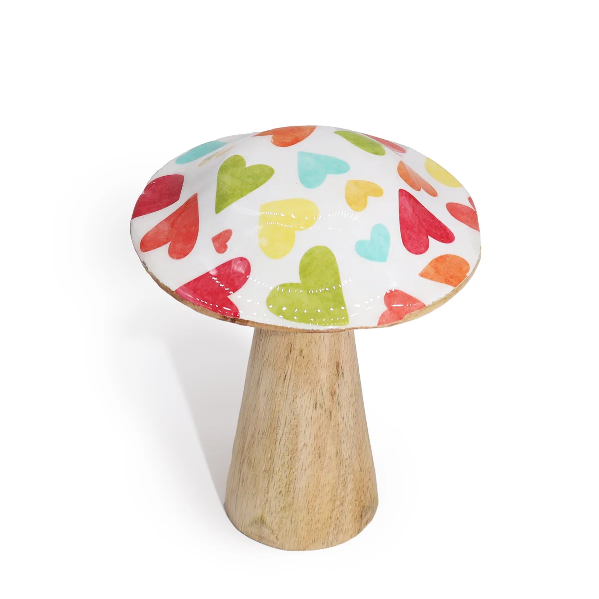 Small wooden mushroom featuring pastel hearts decoration on its cap against a white background