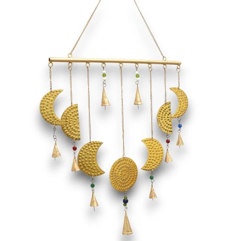 Brass wind chimes featuring moon phases design hanging with metal tubes and crescent moon accents