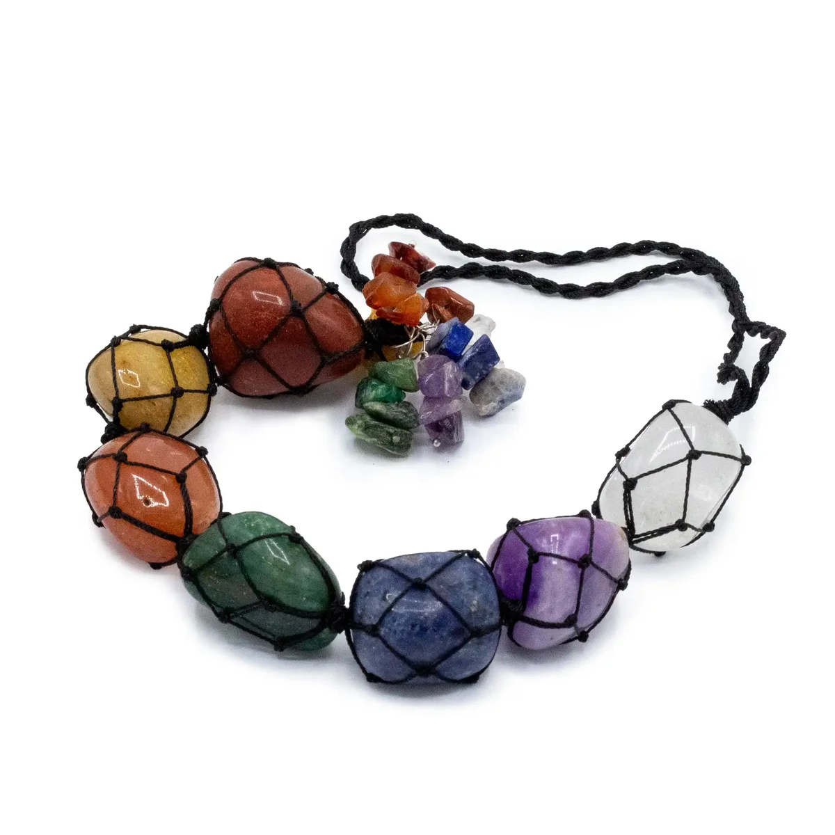 Hanging seven chakra pendant featuring seven colorful chakra stone chips on a silver chain against white background
