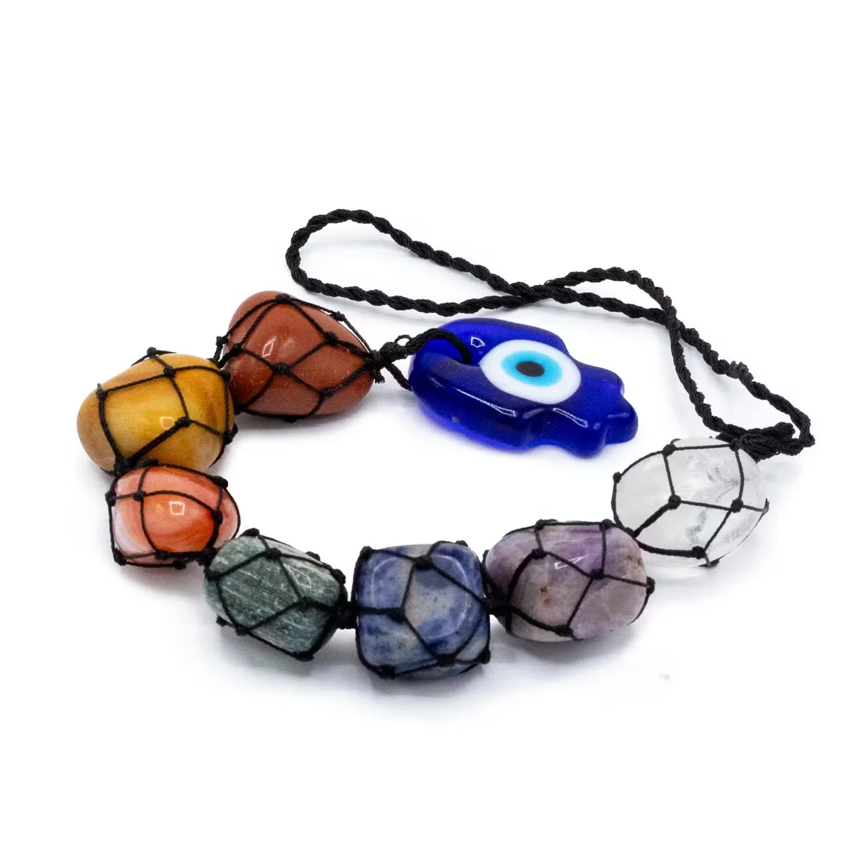 Hanging chakra stone pendant with multicolored stones on a spiritual stone necklace chain against white background