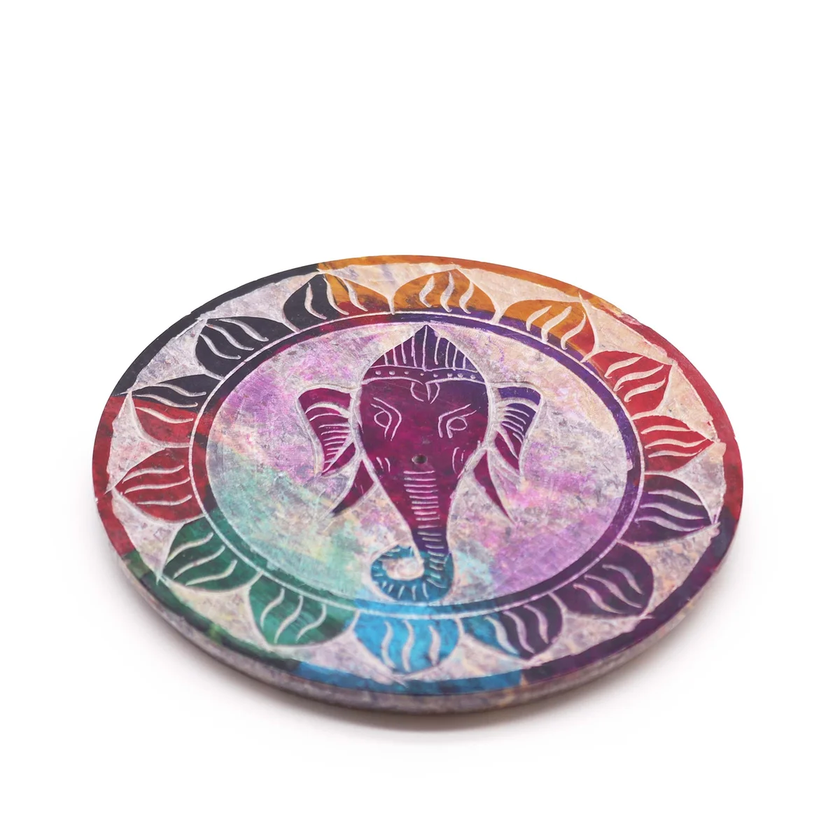 Soapstone disc incense holder featuring a carved Ganesha design on a round base with incense stick slot