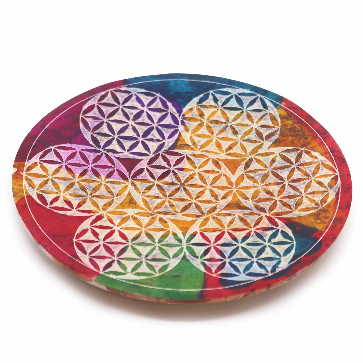 Soapstone disc holder featuring seven Flower of Life designs carved on a round incense holder surface