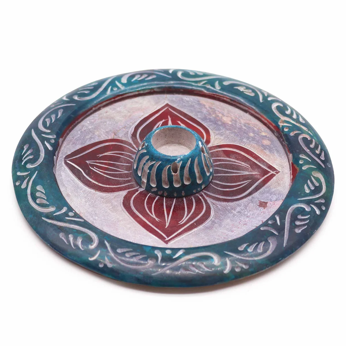 Soapstone disc four petal incense holder designed to hold cone incense securely on flat surfaces