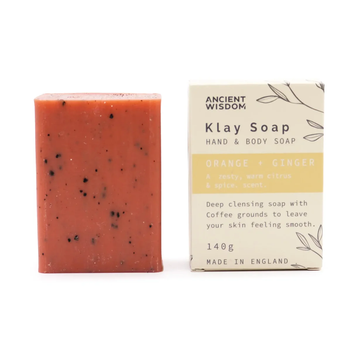 Bar of Klay natural scented soap in orange and ginger scent with textured surface on white background