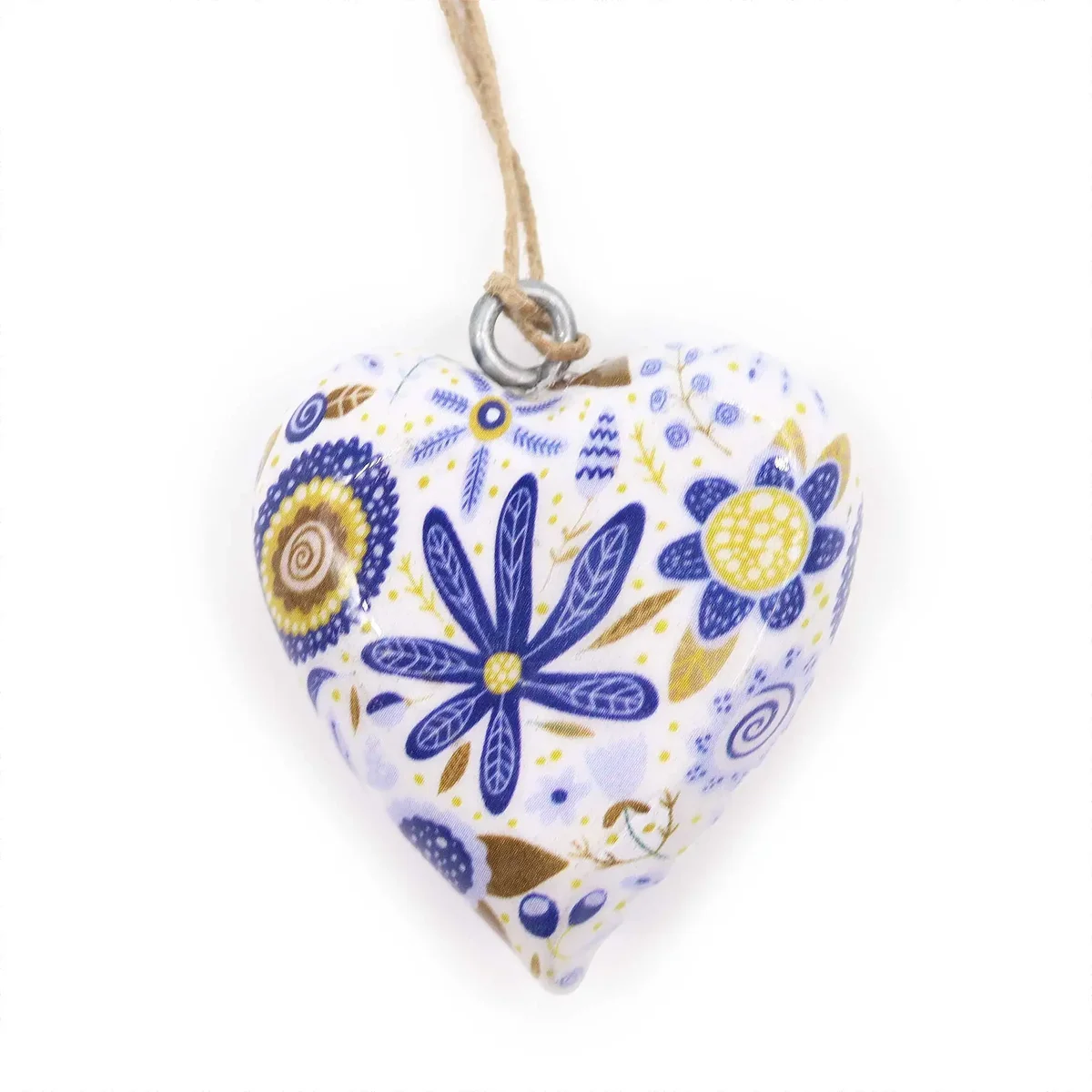 Large wooden heart-shaped decor piece featuring blue floral decor design on front surface
