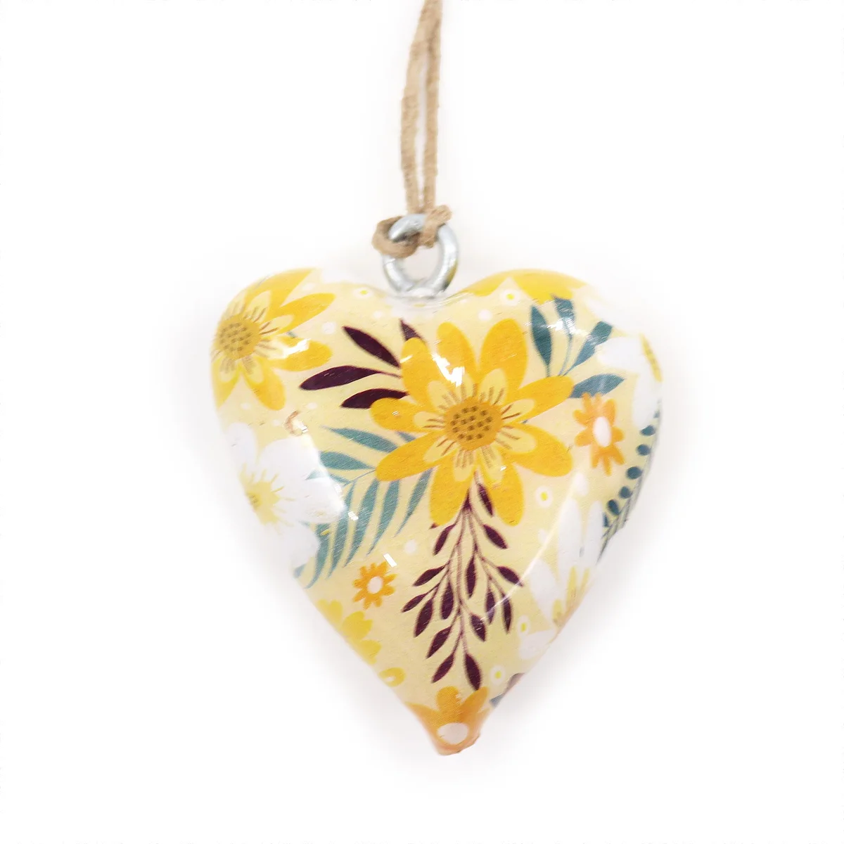 Large yellow floral wooden heart decoration with painted flowers on a wood surface for home decor
