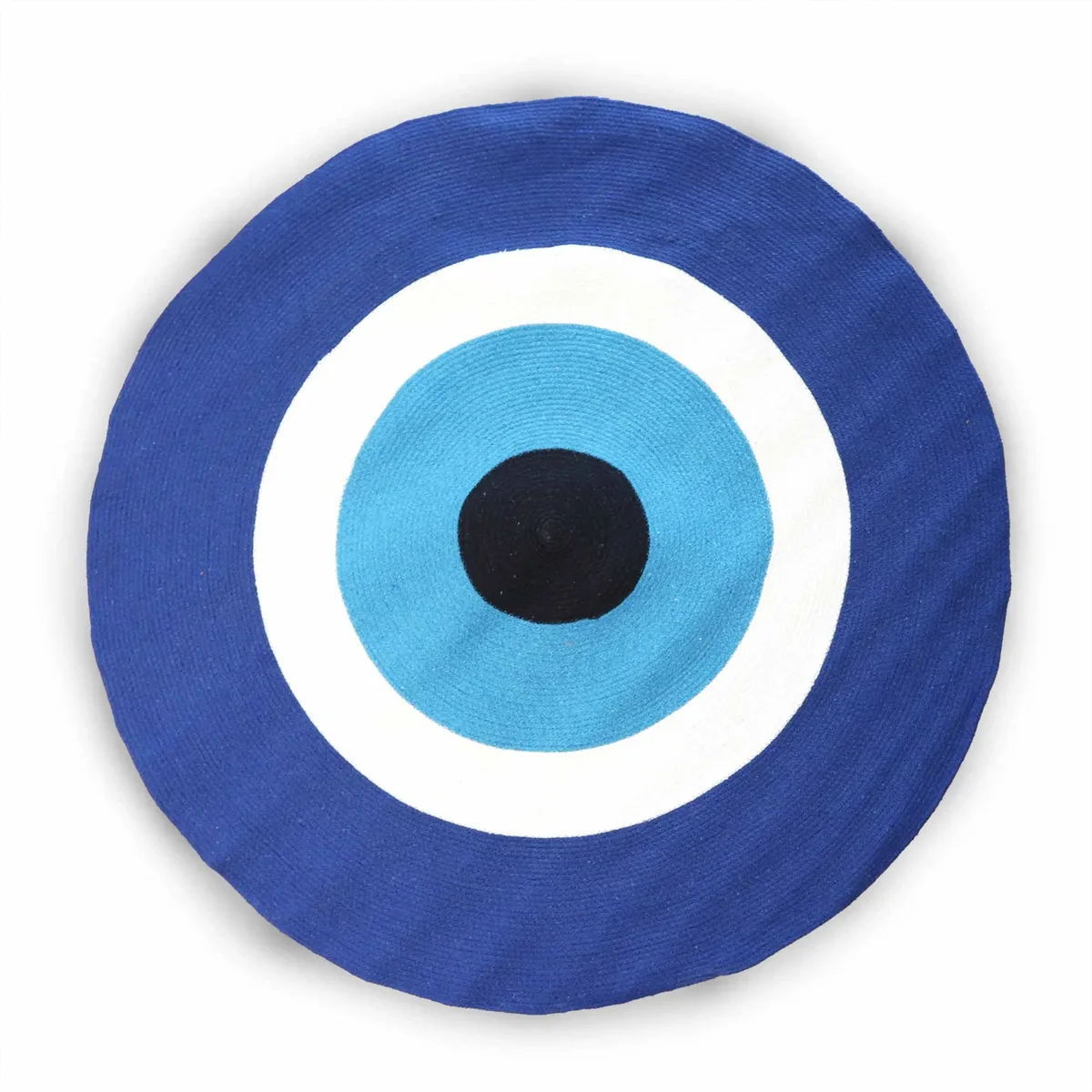 Round cotton rope evil eye decor rug with blue and white concentric circle design on a neutral background