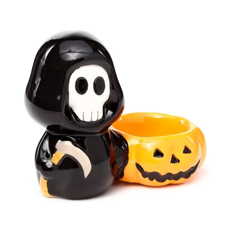 White ceramic skull tea light holder shaped like a boy's head with a hollow top for candle placement