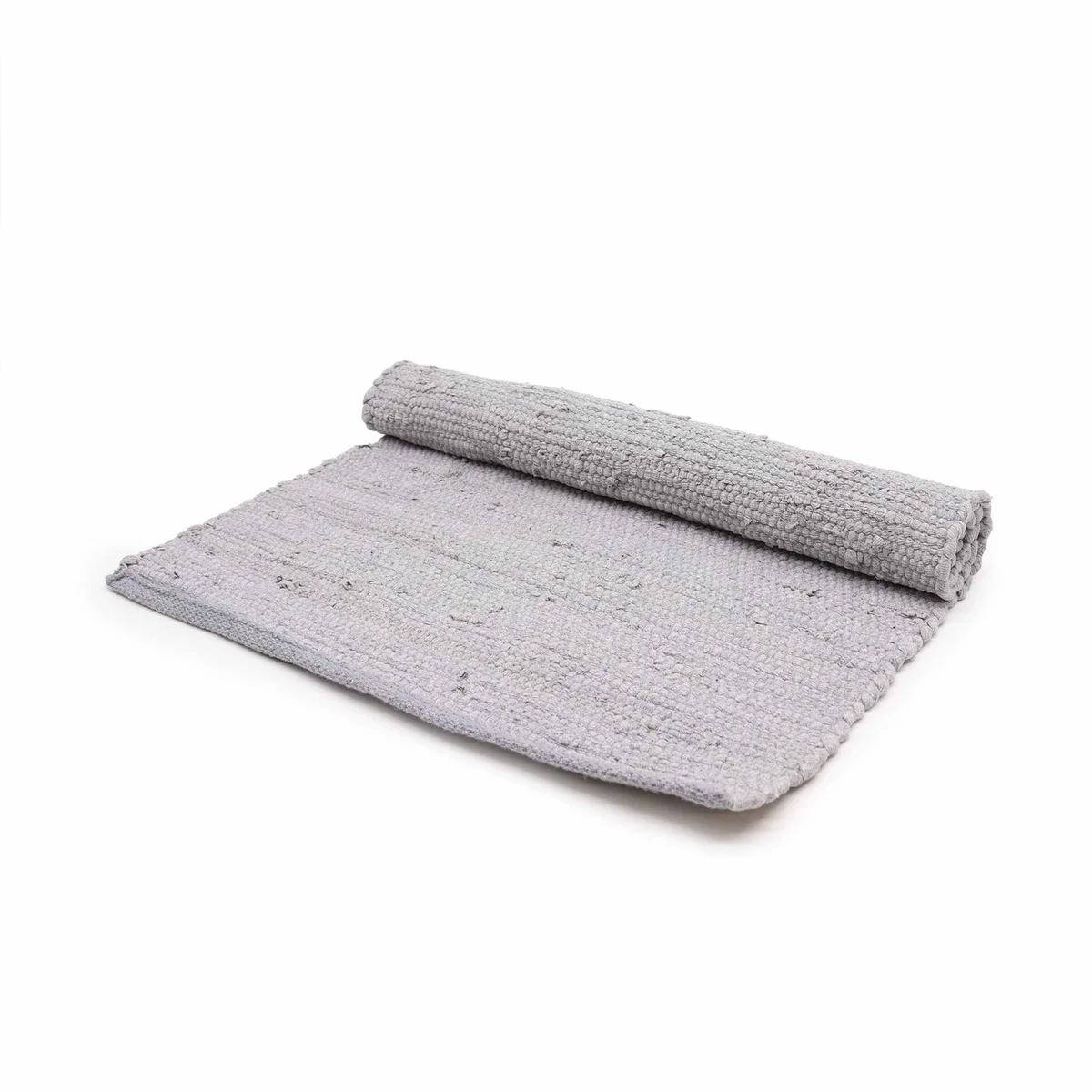 Small grey cotton rug handwoven in India, showcasing detailed handloom texture and pattern on a flat surface