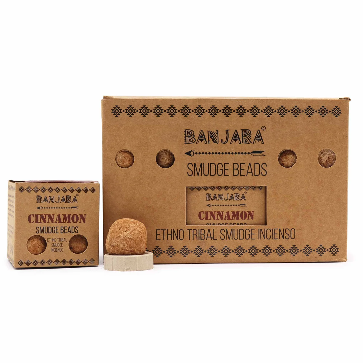Close-up of cinnamon-coloured decorative smudge beads from Banjara Smudge Beads collection on white background