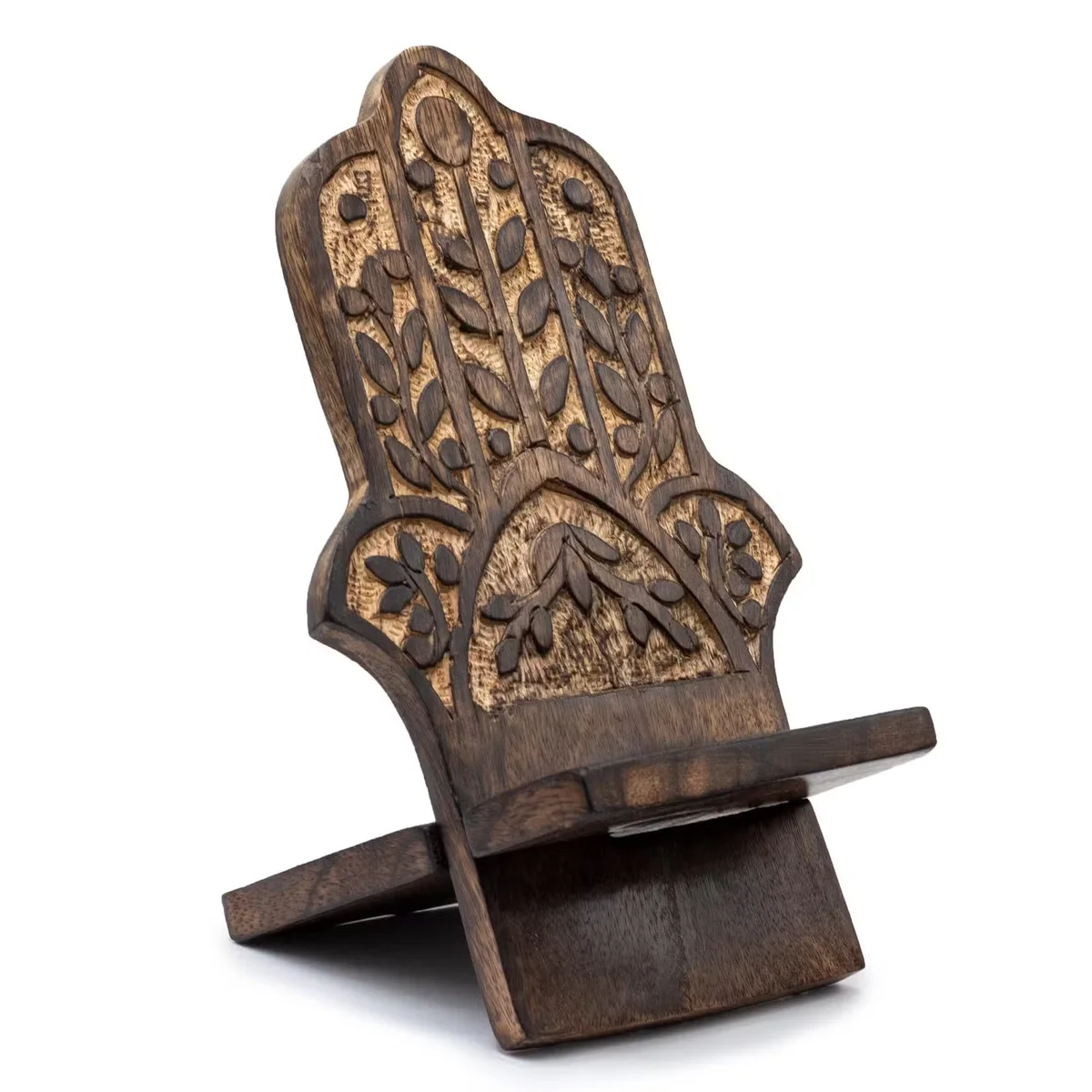 Wooden mobile stand carved with Hamsa design, angled to hold a phone securely on a flat surface